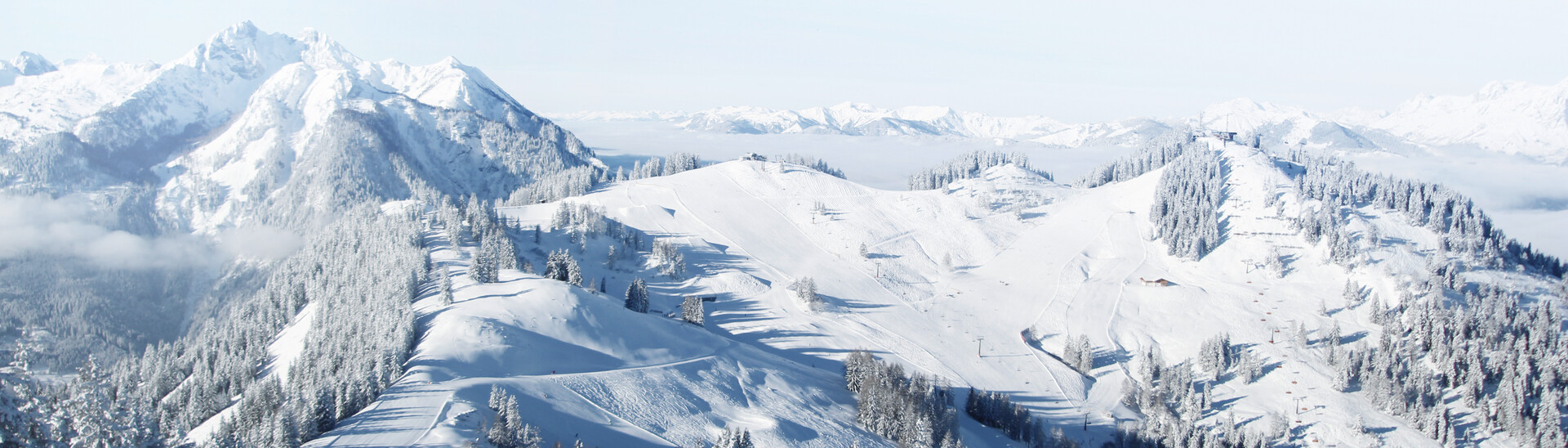 Snow-covered landscape with Hirschkogel and Gernkogel mountains in St. Johann-Alpendorf at Snow Space Salzburg ski resort | © Snow Space Salzburg