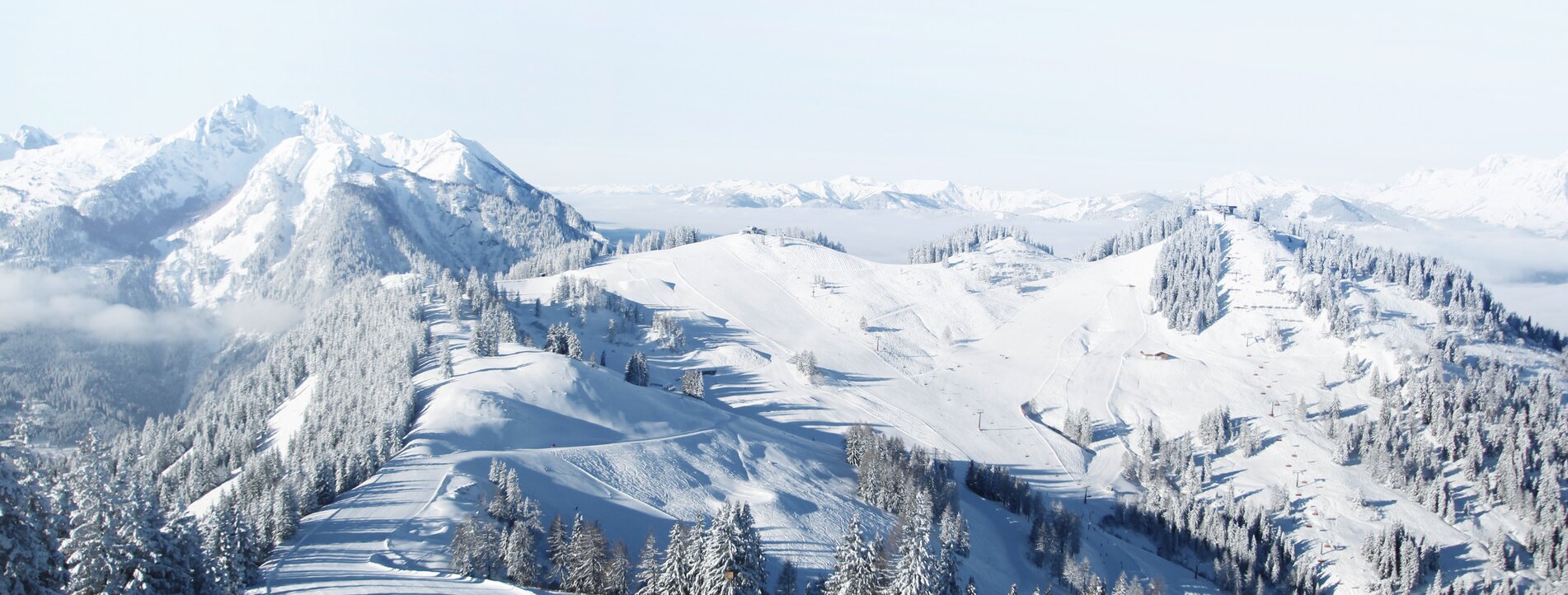 Snow-covered landscape with Hirschkogel and Gernkogel mountains in St. Johann-Alpendorf at Snow Space Salzburg ski resort | © Snow Space Salzburg